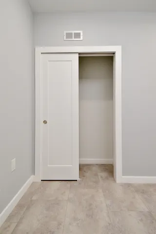 an empty room with closet