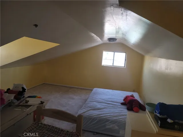 a bathroom with a shower and a sink