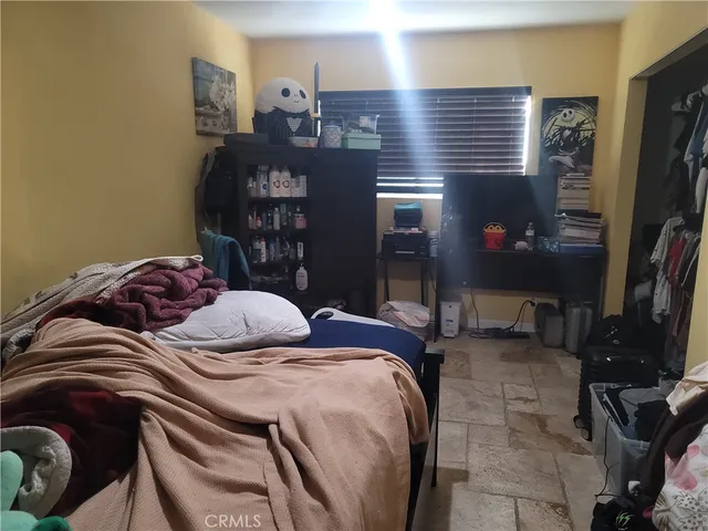 a terrace with outdoor seating and city view