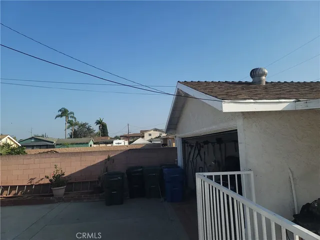 a view of balcony with a potted plant
