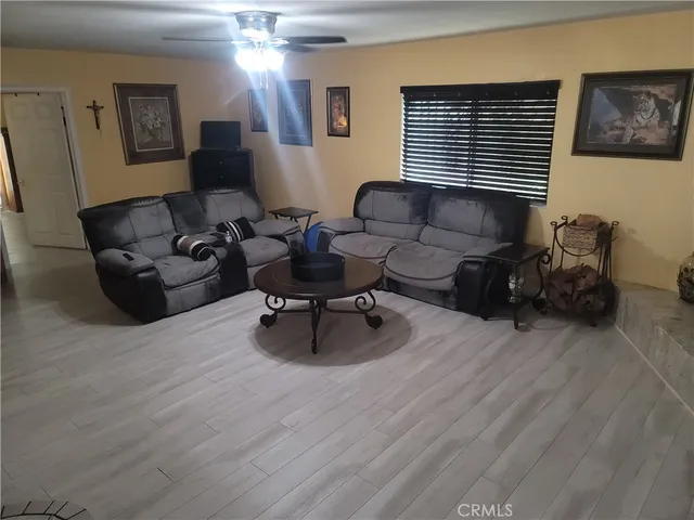 a kitchen with a sink and a stove top oven