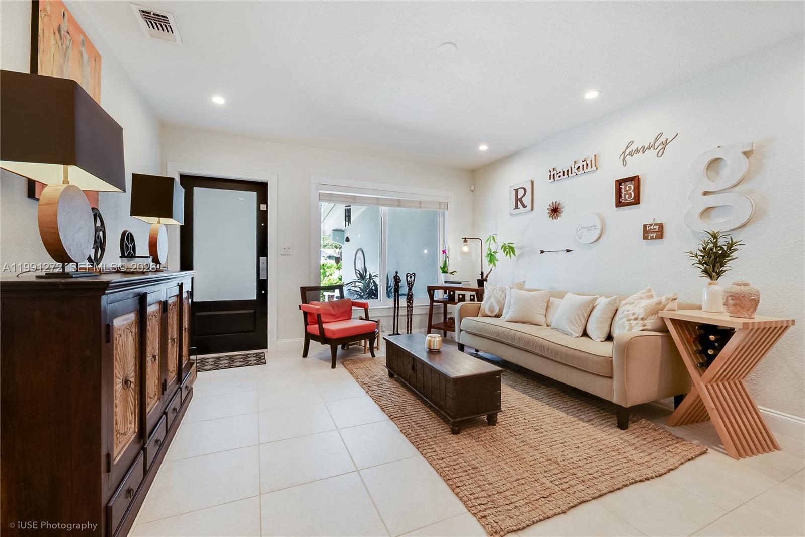 8535 Southwest 97th Road Miami, FL 33173 - Photo 3 of 28 a living room with furniture and wooden floor