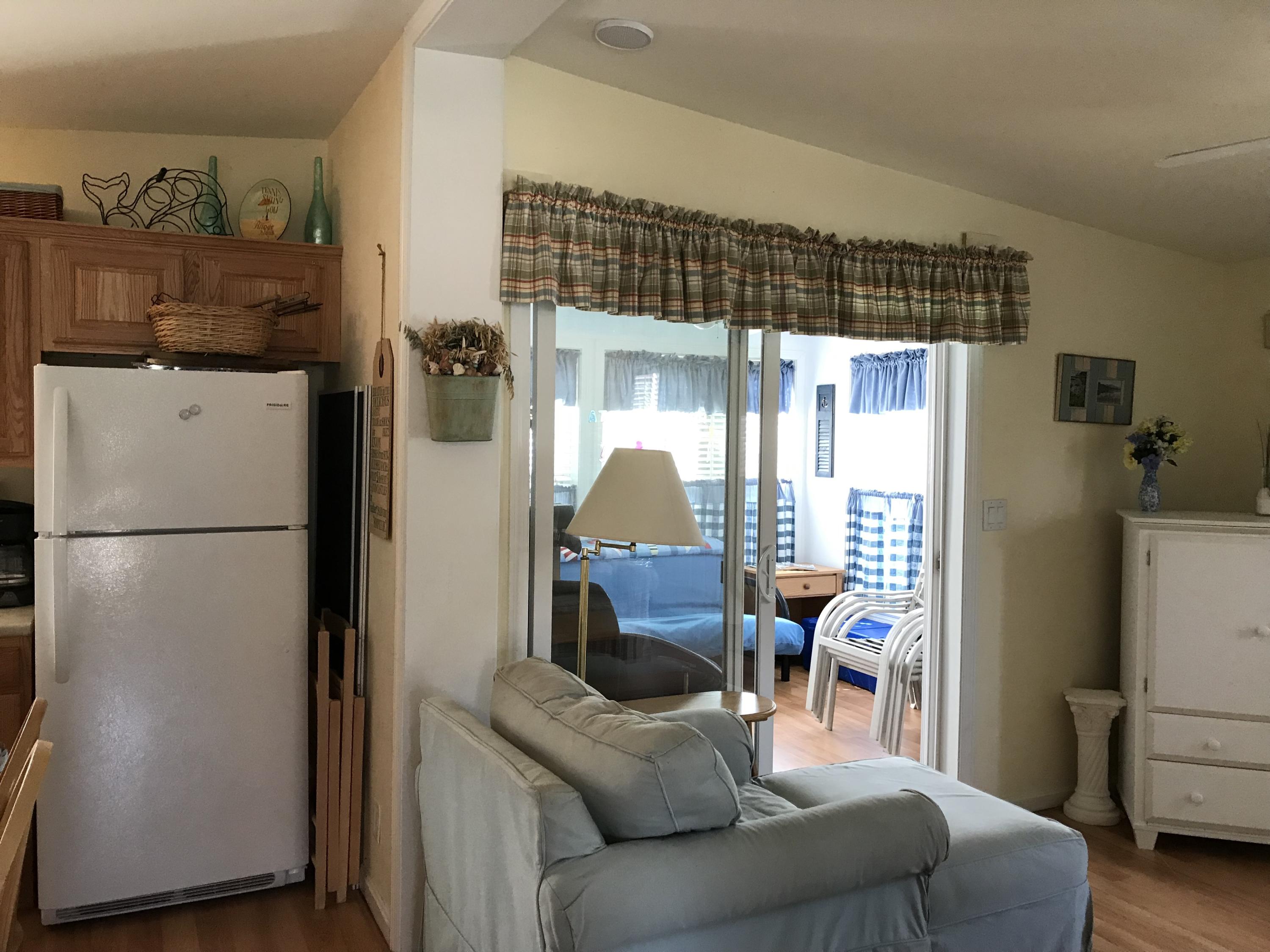 412 Post Road, Unit 103 Wells, ME 04090 - Photo 7 of 23 view to 3 seasons room