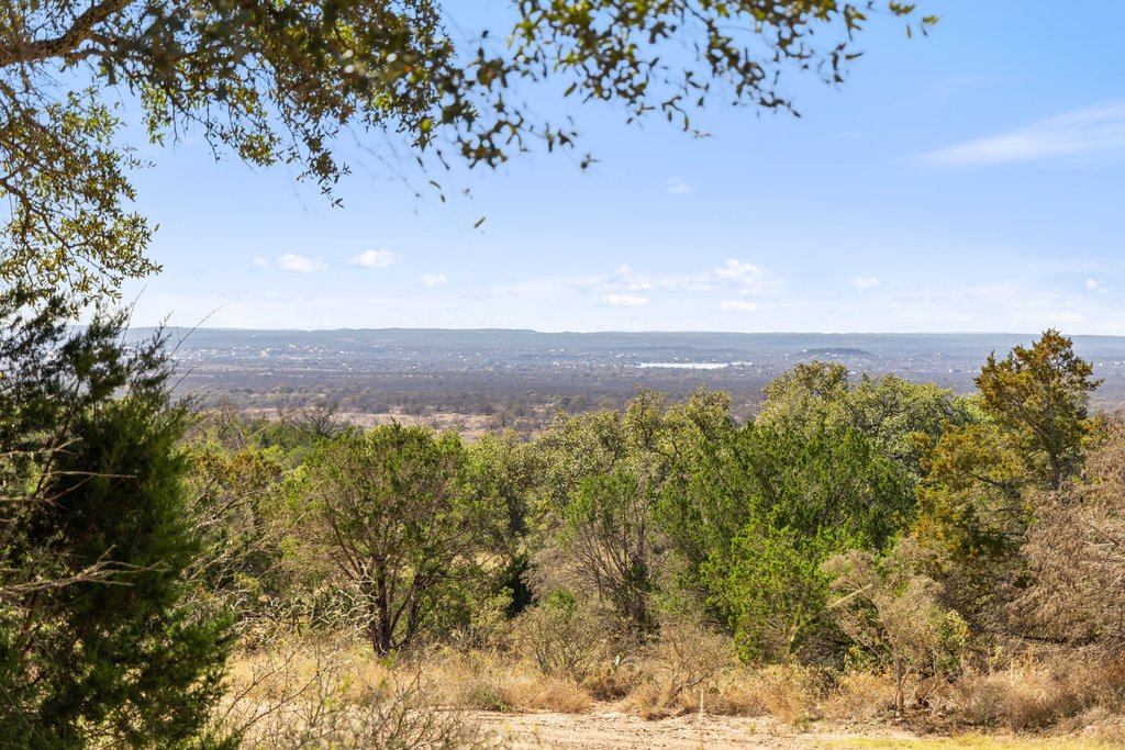 1101 Crider Road Marble Falls, TX 78654 - Photo 14 of 34 Water view featuring a heavily wooded area