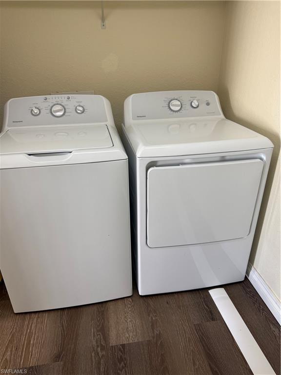 7985 Preserve Circle, Unit 1133 Naples, FL 34119 - Photo 30 of 36 a utility room with dryer and washer