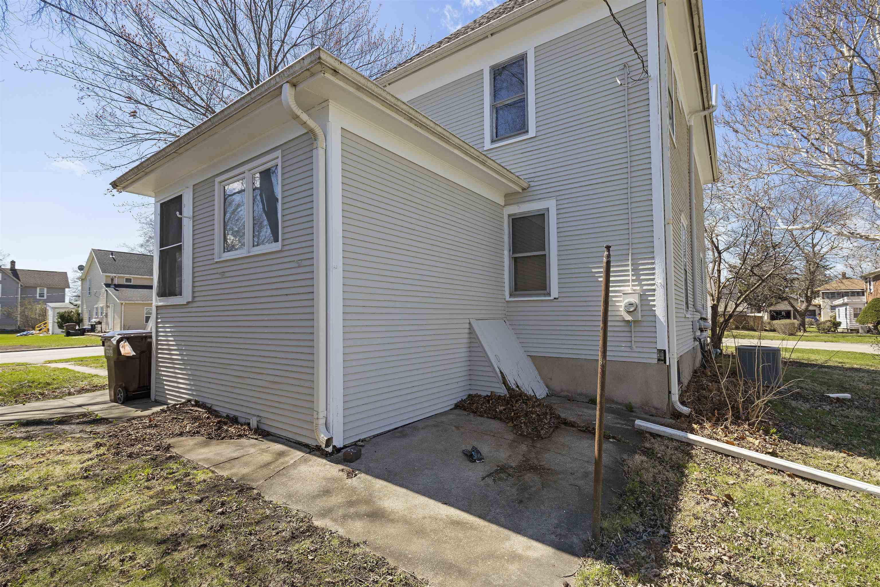 703 North Main Street Rochelle, IL 61068 - Photo 19 of 21 a view of a house with backyard