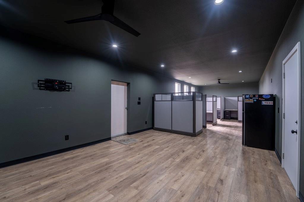 15193 Robin Road Haslet, TX 76052 - Photo 9 of 14 a view of a refrigerator in wooden floor