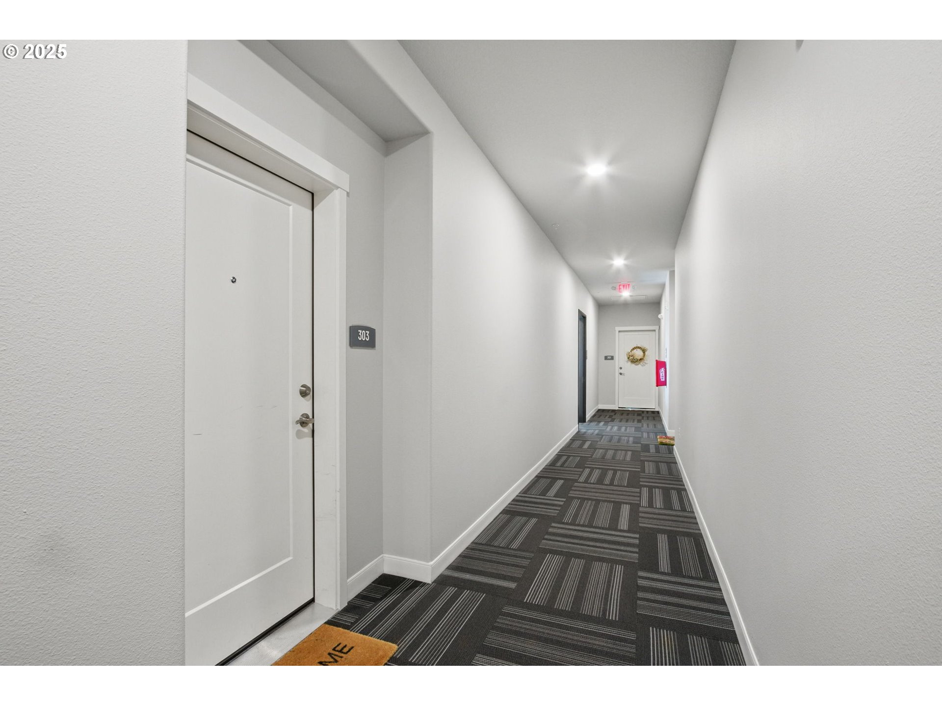 16322 Northwest Chadwick Way, Unit 303 Portland, OR 97229 - Photo 3 of 23 a view of an empty room