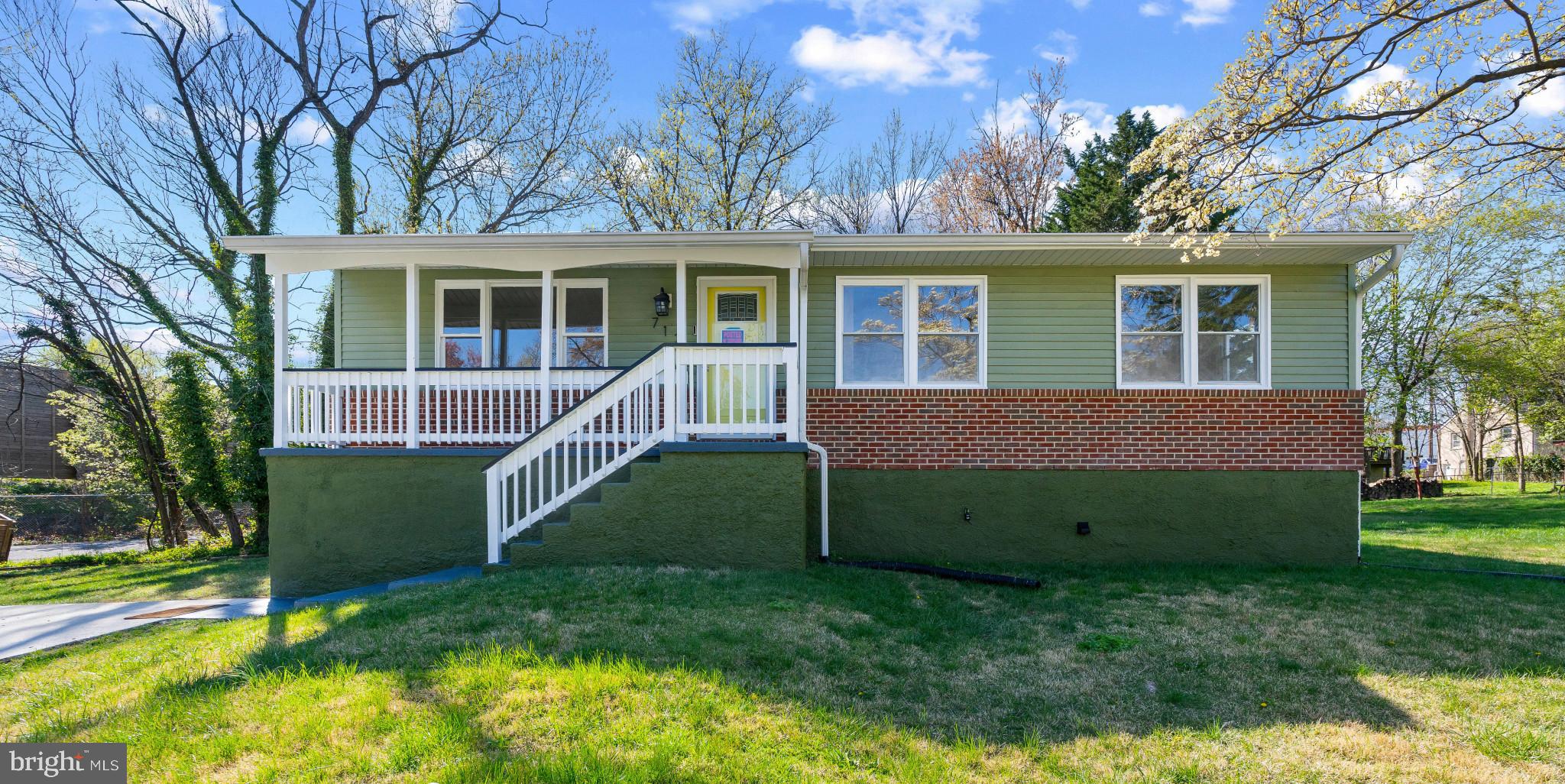 712 Kent Avenue Baltimore, MD 21228 - Photo 3 of 30 front view of a house with a yard