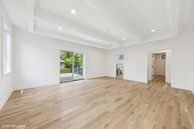 a bathroom with a double vanity sink a mirror and a shower