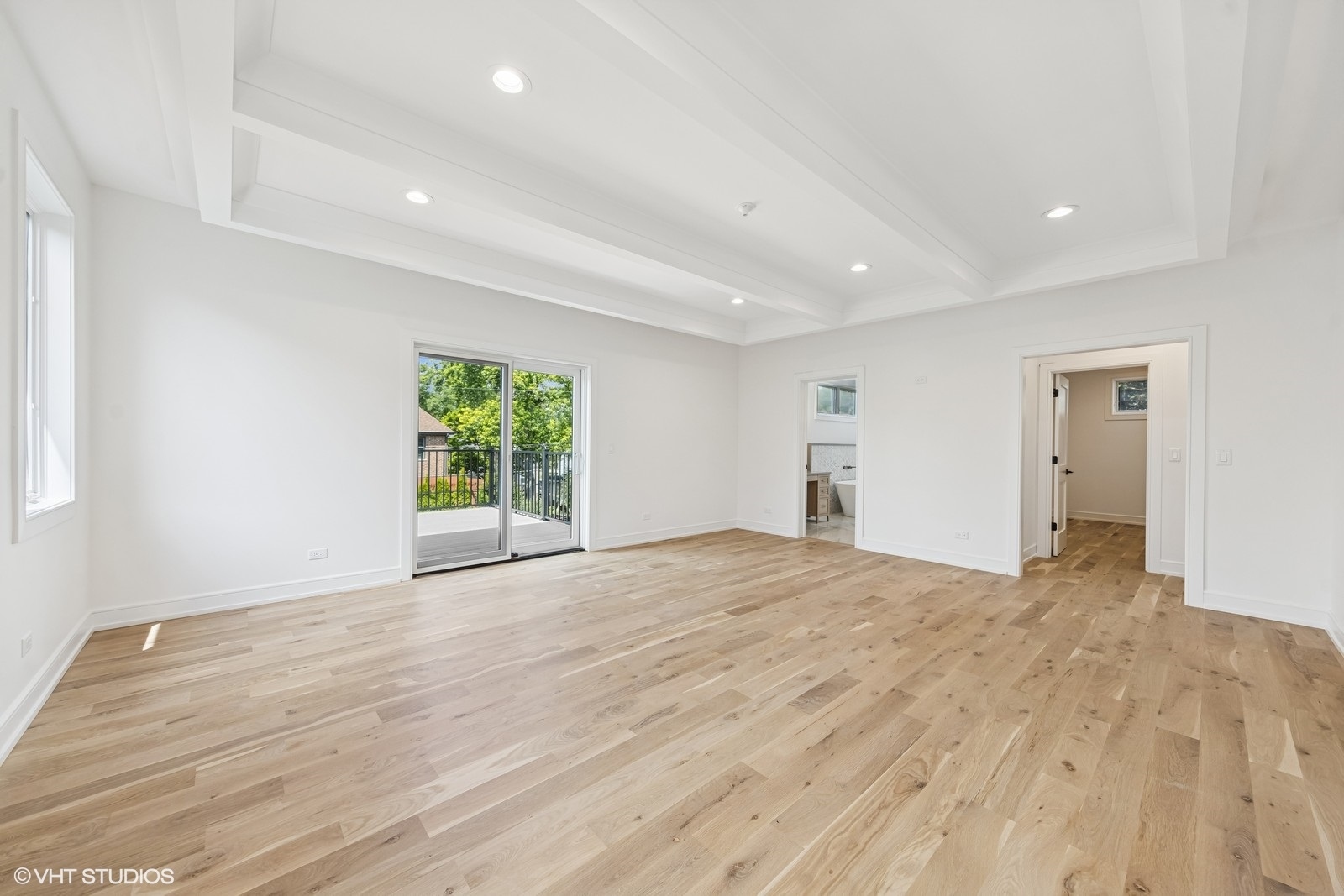 936 Mitchell Avenue Elmhurst, IL 60126 - Photo 14 of 44 a view of an empty room with wooden floor and a window