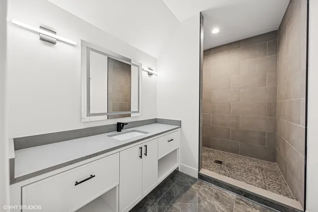 an empty room with a empty space and wooden floor