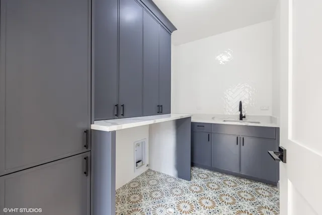 a bathroom with a sink a toilet and bathtub