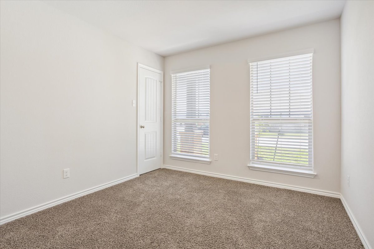 5830 Copano Road Belton, TX 76513 - Photo 26 of 34 Unfurnished room featuring carpet floors and baseboards