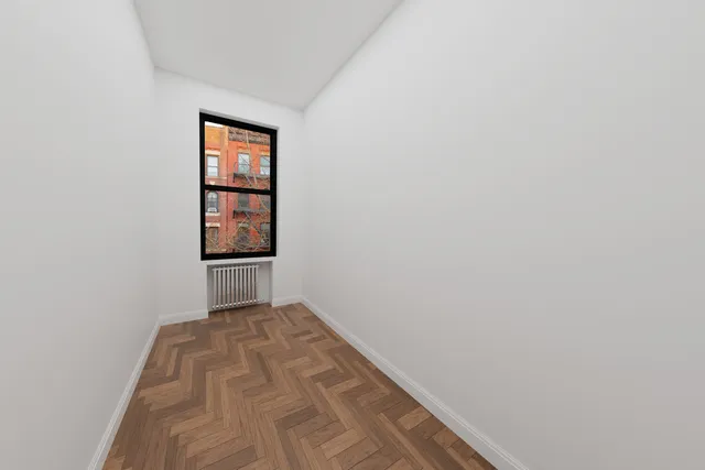 a view of a room with windows