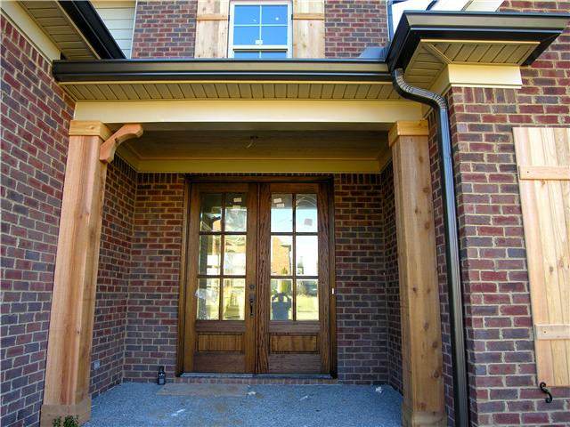 3202 Appian Way, Unit 70 Spring Hill, TN 37174 - Photo 3 of 20 8' Tall, solid, mahogany, French doors, with beveled glass, greet you at the front porch.