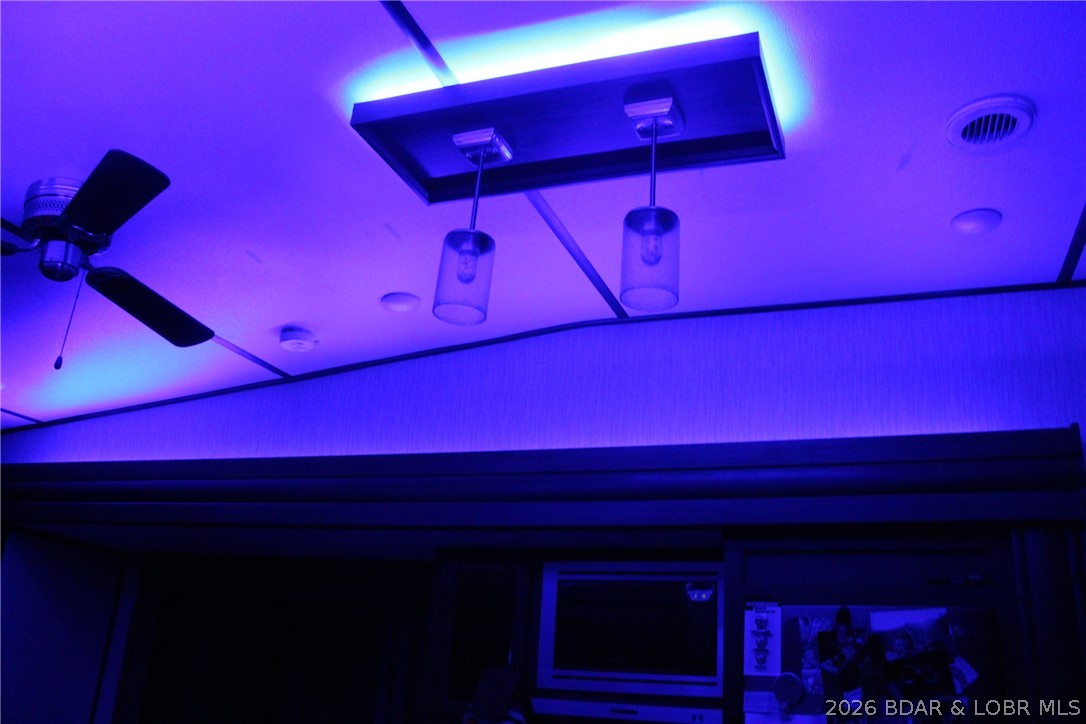 30932 Blackbird Road Stover, MO 65078 - Photo 11 of 53 Nice LED blue light in the 5th wheel kitchen