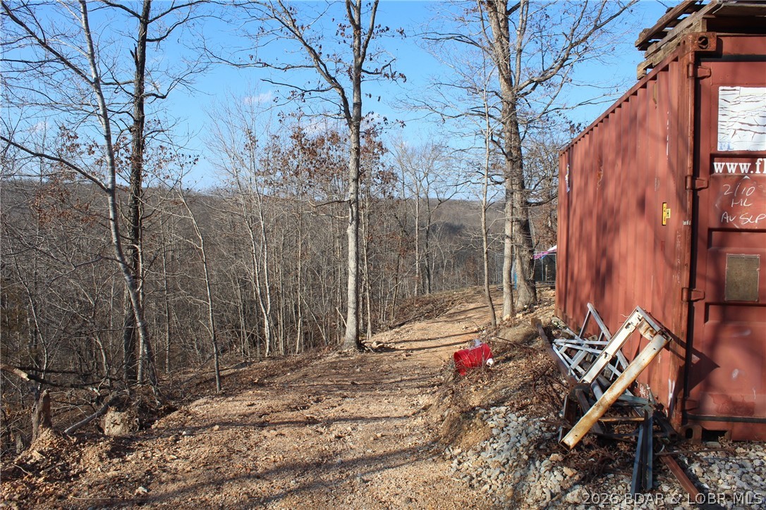 30932 Blackbird Road Stover, MO 65078 - Photo 26 of 53 Side-by-side trail to the other side of the garage