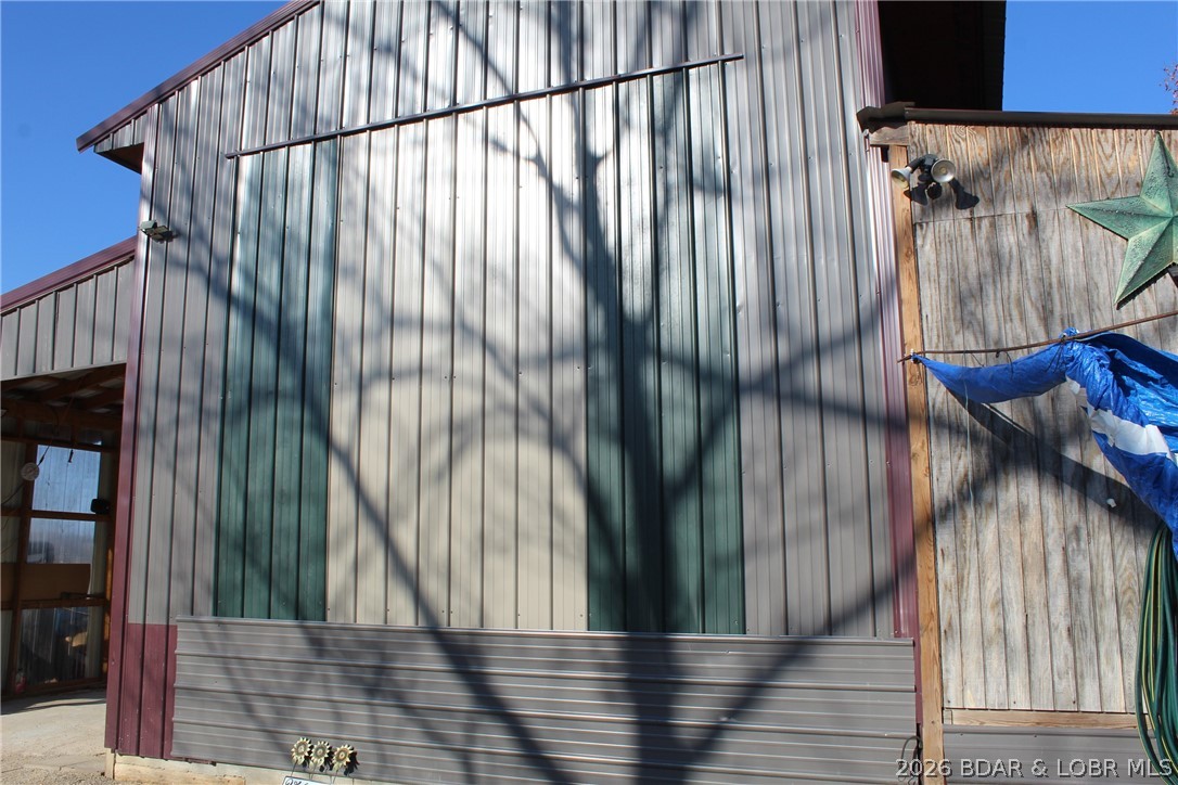 30932 Blackbird Road Stover, MO 65078 - Photo 4 of 53 Green and light gray paneling can come off to pull