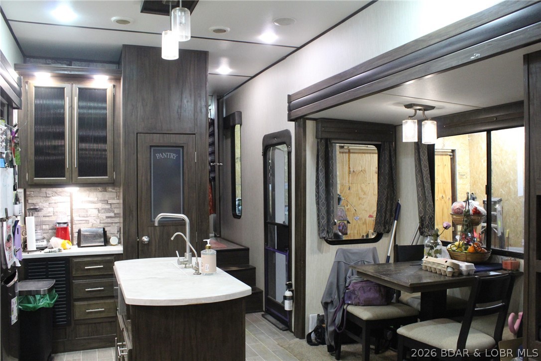 30932 Blackbird Road Stover, MO 65078 - Photo 6 of 53 Kitchen/dining room of the 5th wheel