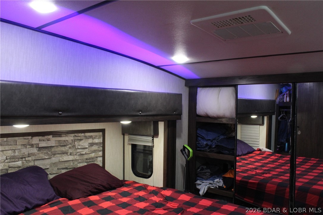 30932 Blackbird Road Stover, MO 65078 - Photo 9 of 53 The bedroom with the LED blue lights