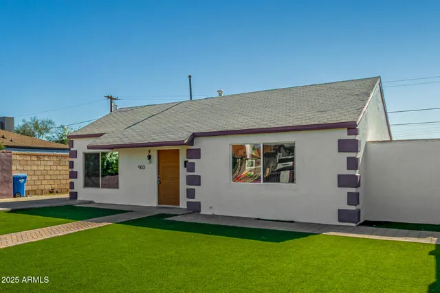 a house view with a garden space