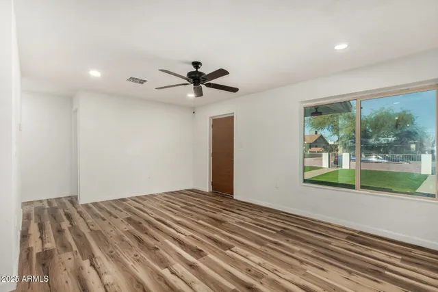 a view of a room with a large window