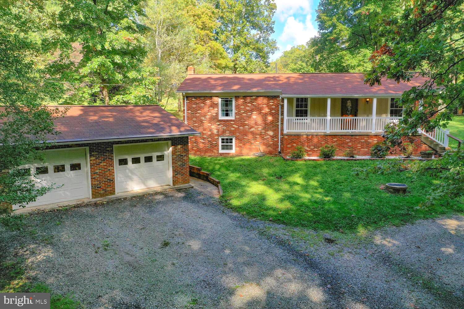 FULLY REMODELED RAISED RAMBLER OVER FULL BASEMENT!