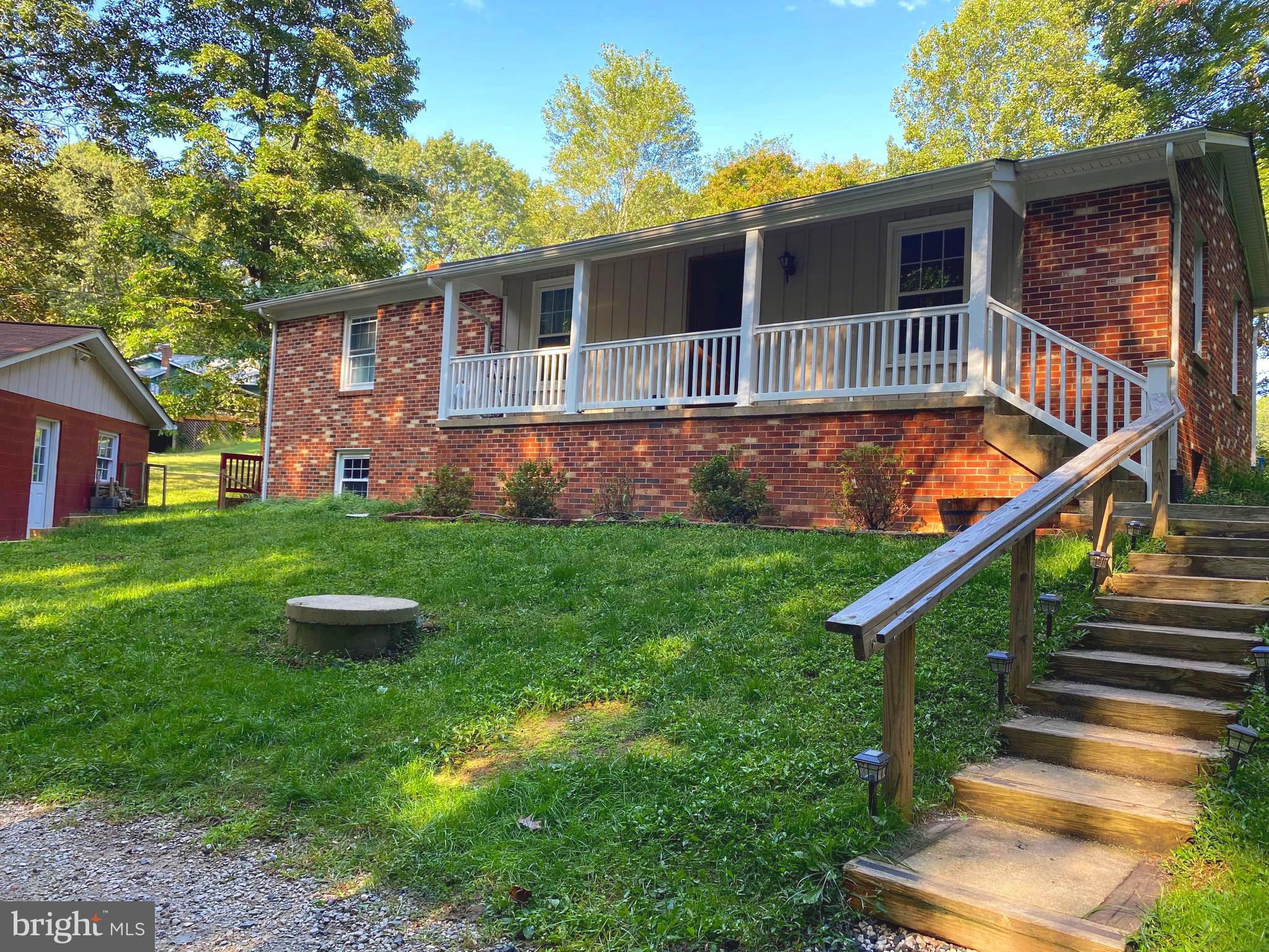 FULLY REMODELED RAISED RAMBLER OVER FULL BASEMENT!