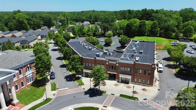 an aerial view of a city with lots of residential buildings