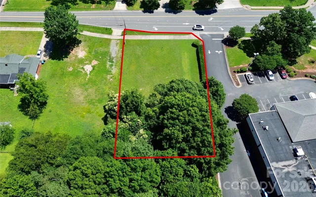 an aerial view of a house with a garden