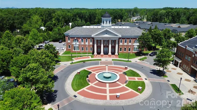 an aerial view of a swimming pool and outdoor space