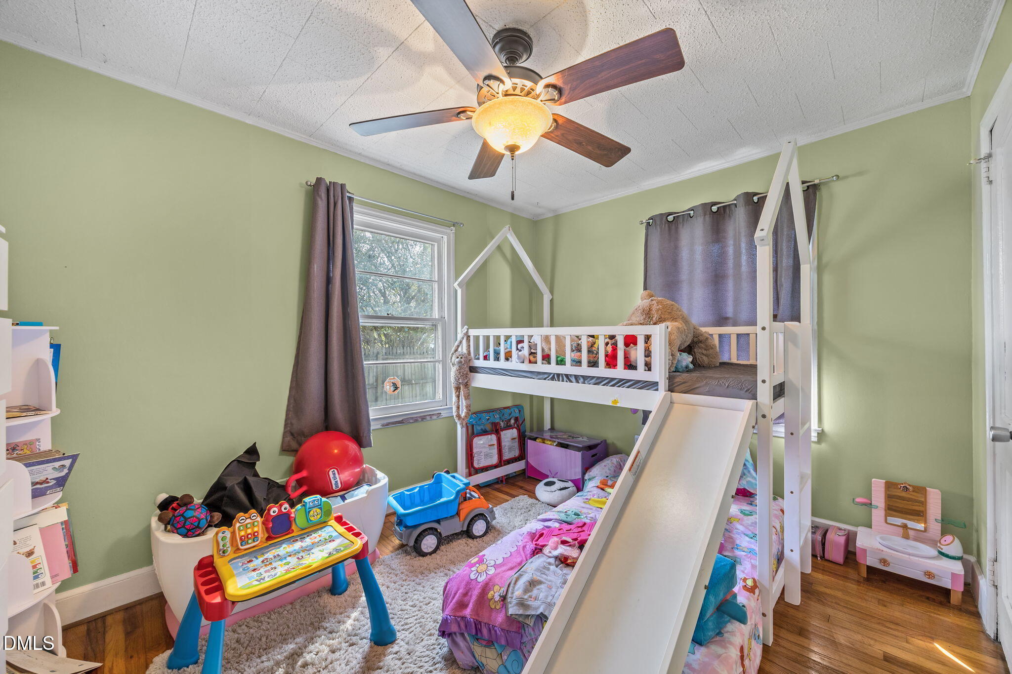 2727 Highway 87 Graham, NC 27253 - Photo 19 of 28 a bedroom with furniture and a baby crib