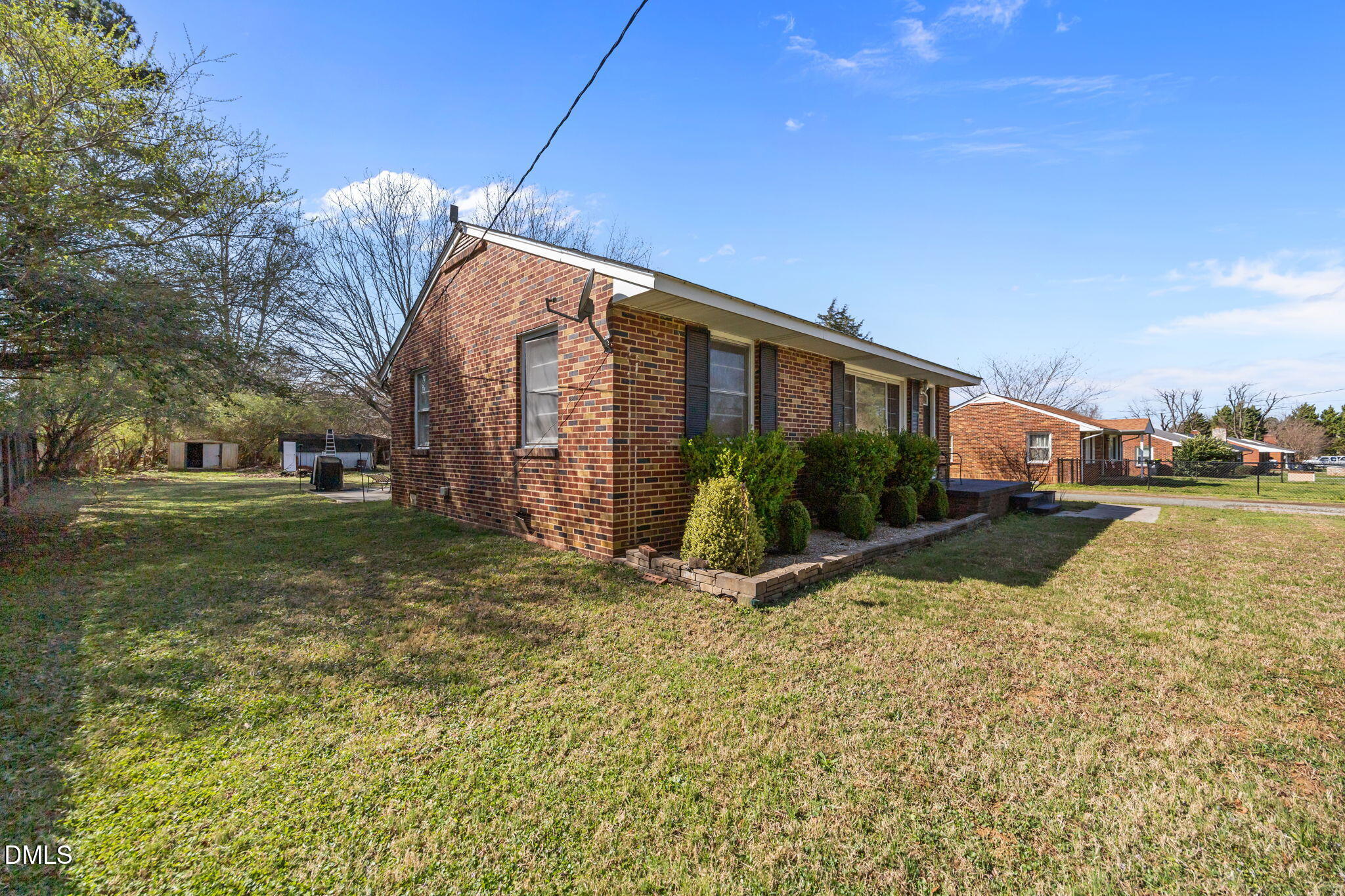 2727 Highway 87 Graham, NC 27253 - Photo 22 of 28 a backyard of a house with lots of green space