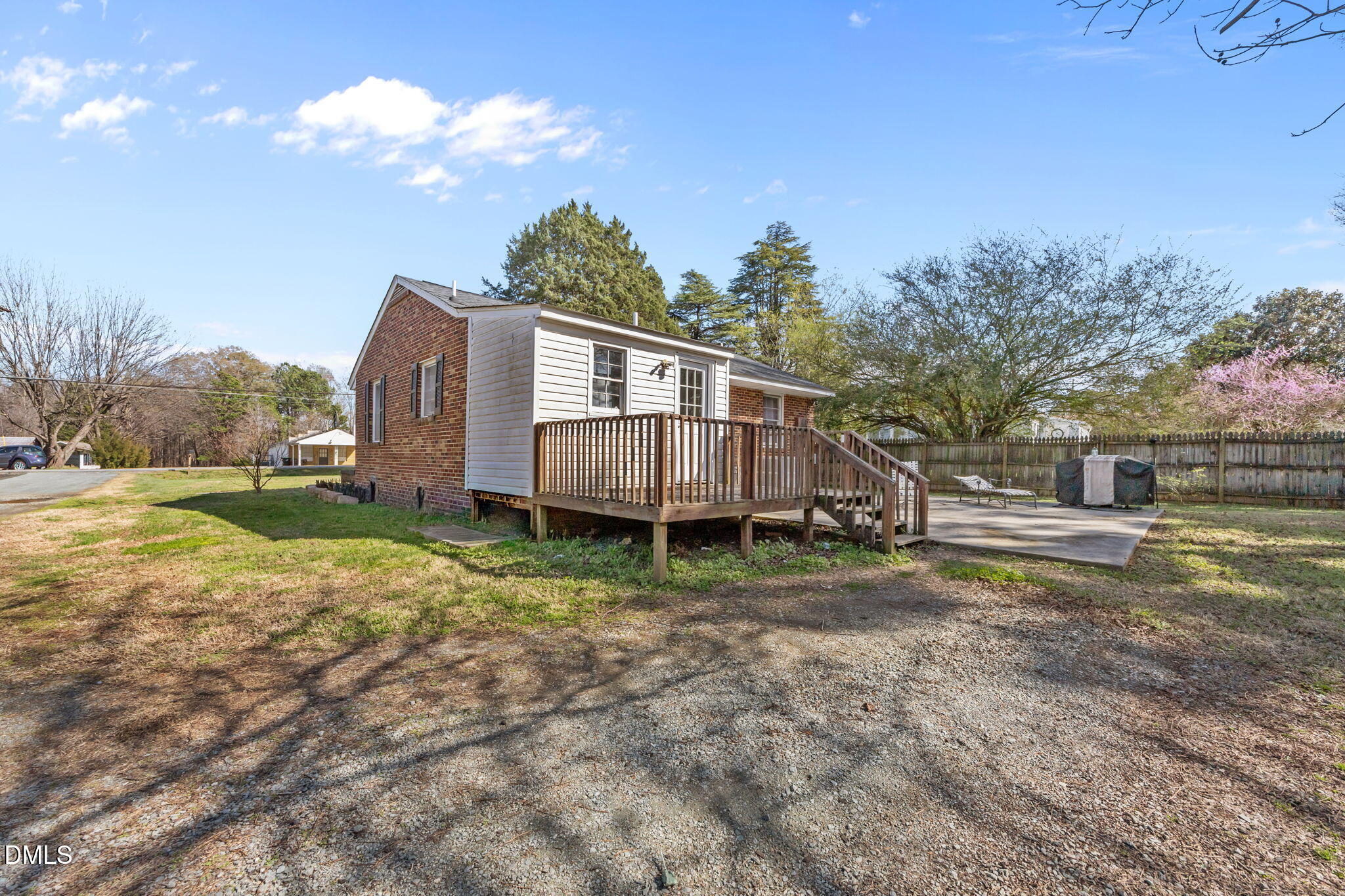 2727 Highway 87 Graham, NC 27253 - Photo 24 of 28 a view of a house with backyard and trees