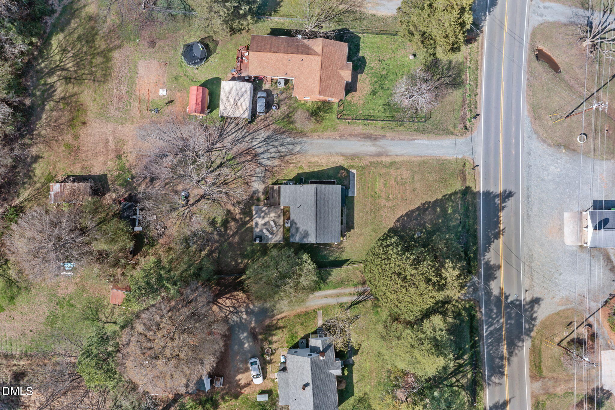 2727 Highway 87 Graham, NC 27253 - Photo 9 of 28 an aerial view of a house with a yard