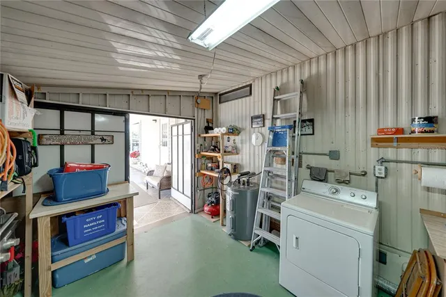 a view of a chairs and table in patio