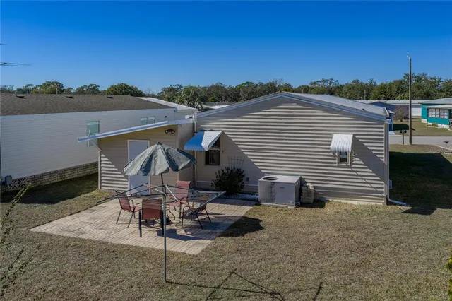 an entryway of a house with wooden floor