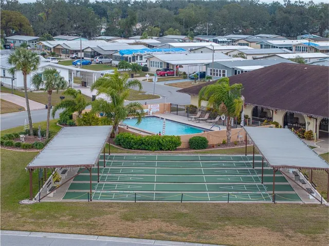 an aerial view of a house with a garden