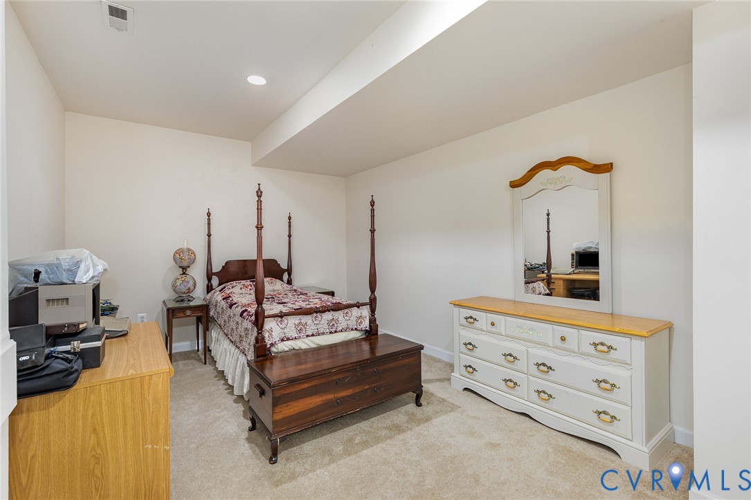 160 Walnut Ridge Drive Stafford, VA 22556 - Photo 31 of 43 Bedroom with light colored carpet and recessed lig