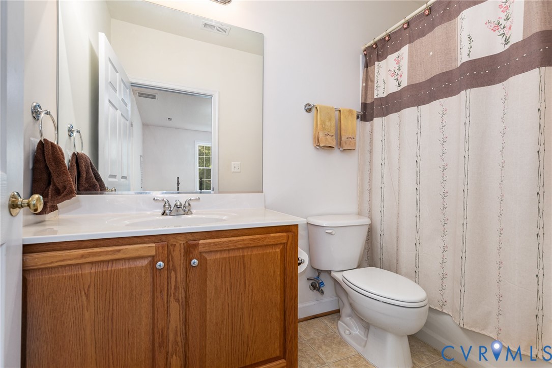 160 Walnut Ridge Drive Stafford, VA 22556 - Photo 32 of 43 Bathroom with vanity, light tile patterned floors,