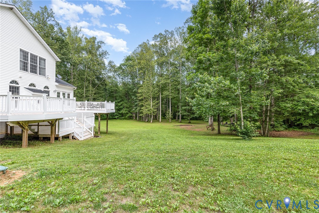 160 Walnut Ridge Drive Stafford, VA 22556 - Photo 36 of 43 View of green lawn with a deck