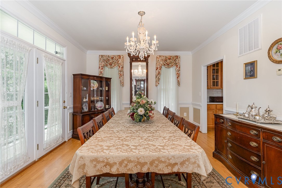 160 Walnut Ridge Drive Stafford, VA 22556 - Photo 8 of 43 Dining room with a chandelier, ornamental molding,