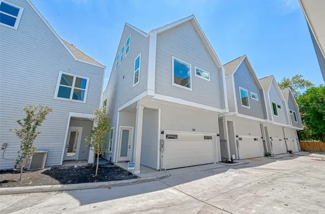 a front view of a house with yard