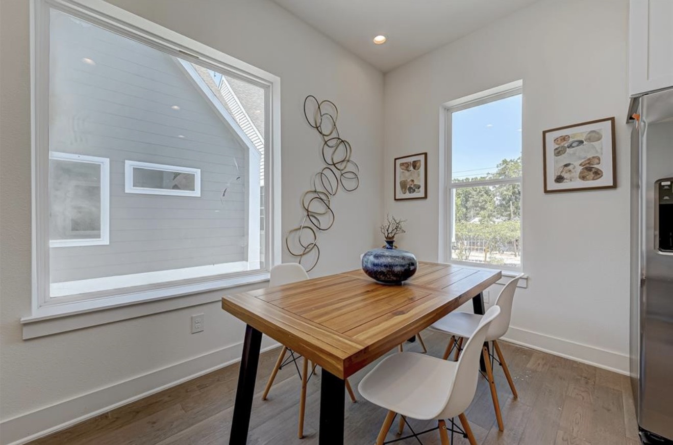 6127 West Montgomery Road Houston, TX 77091 - Photo 16 of 38 a view of a room that has a table and chairs in it