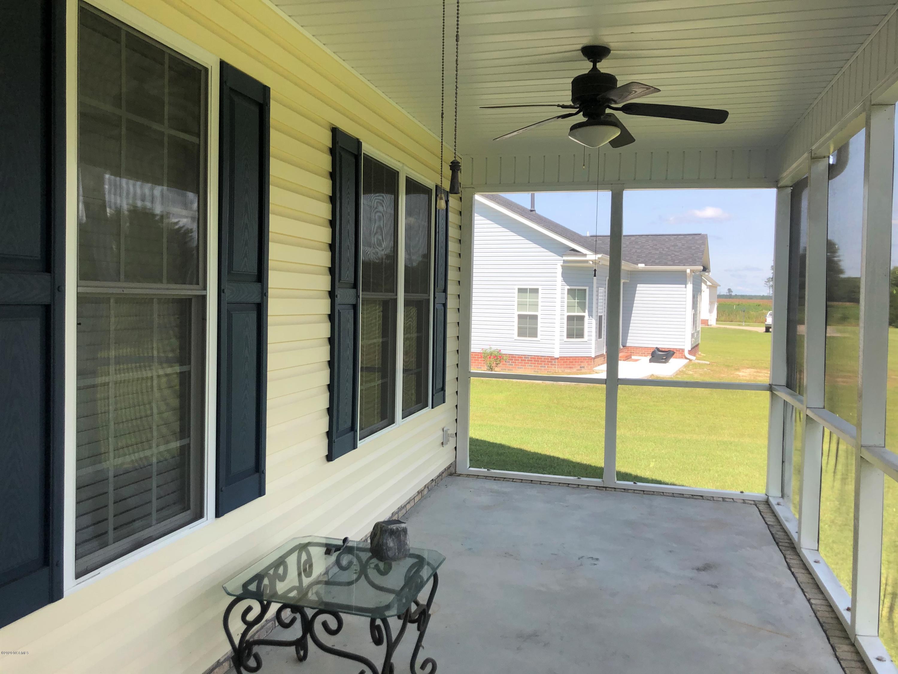 3041 Foxhall Road Farmville, NC 27828 - Photo 16 of 16 Screened Back Patio