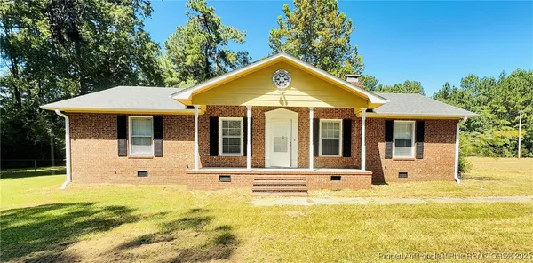 a front view of a house with swimming pool