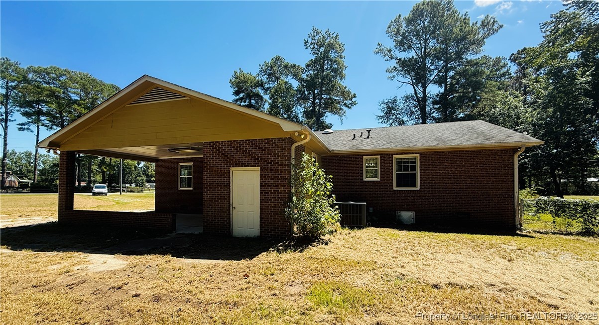 4355 Draughon Road Eastover, NC 28312 - Photo 18 of 20 a view of a house with a yard
