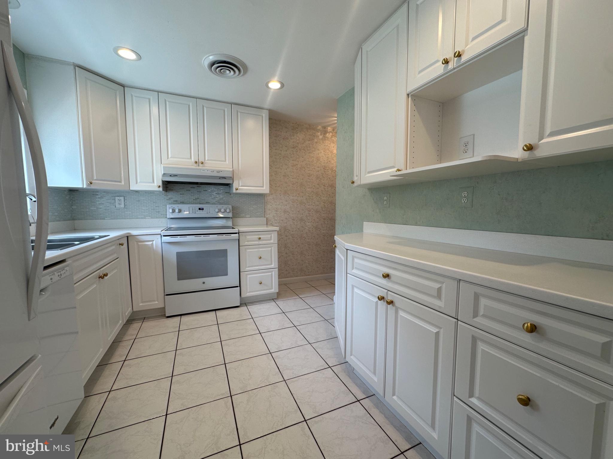 14616 Sturtevant Road Silver Spring, MD 20905 - Photo 10 of 44 Bright and airy kitchen oasis.