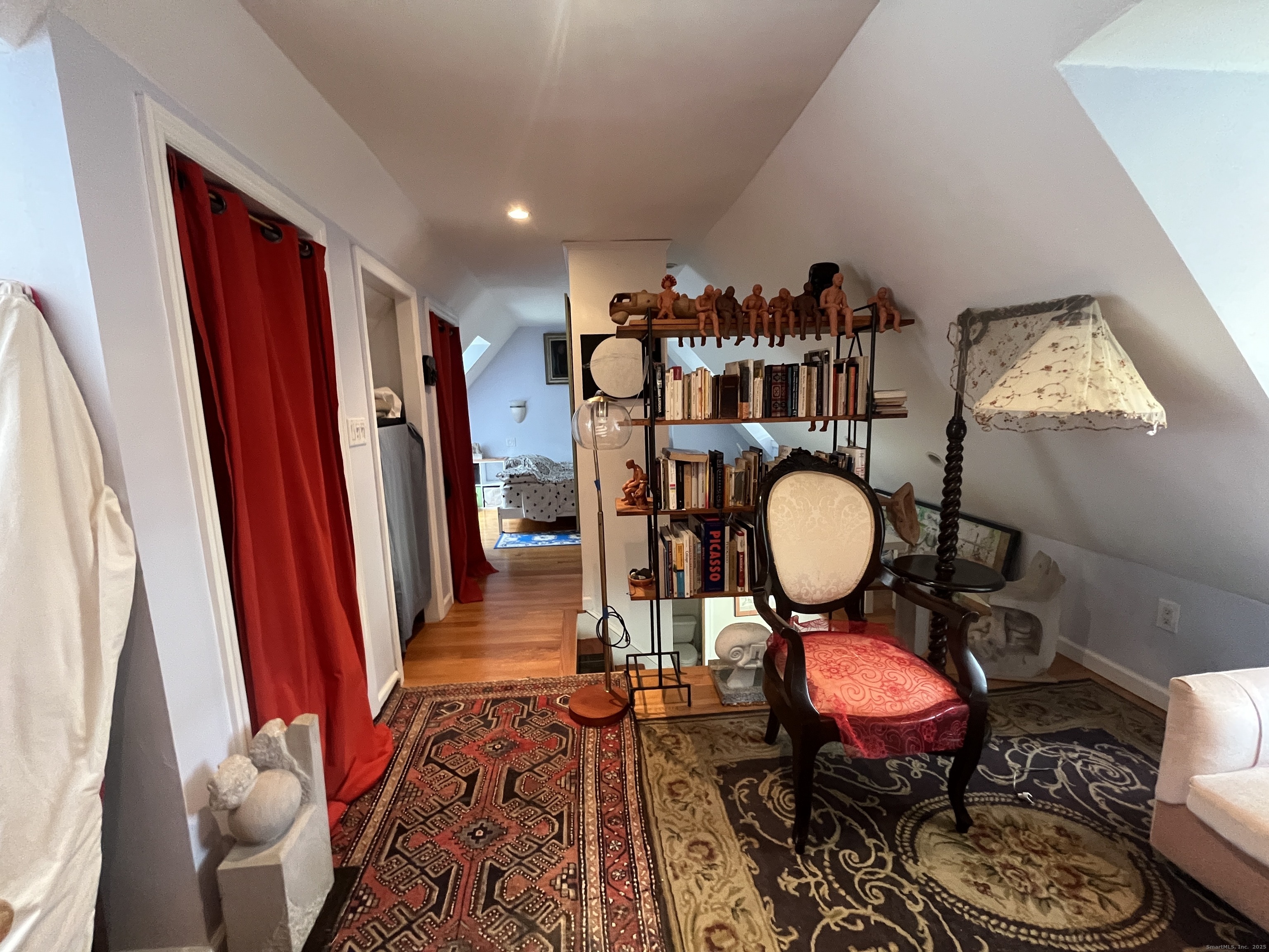 68 Cole Street Bridgeport, CT 06604 - Photo 15 of 31 a living room with furniture a rug and white walls